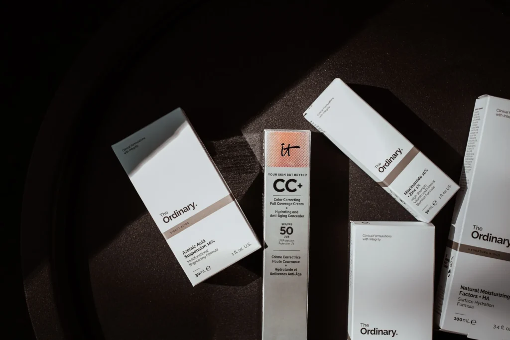 Top rated skincare products for acne-prone skin including cleanser, niacinamide serum, lightweight moisturizer, and sunscreen for a complete daily skincare routine.