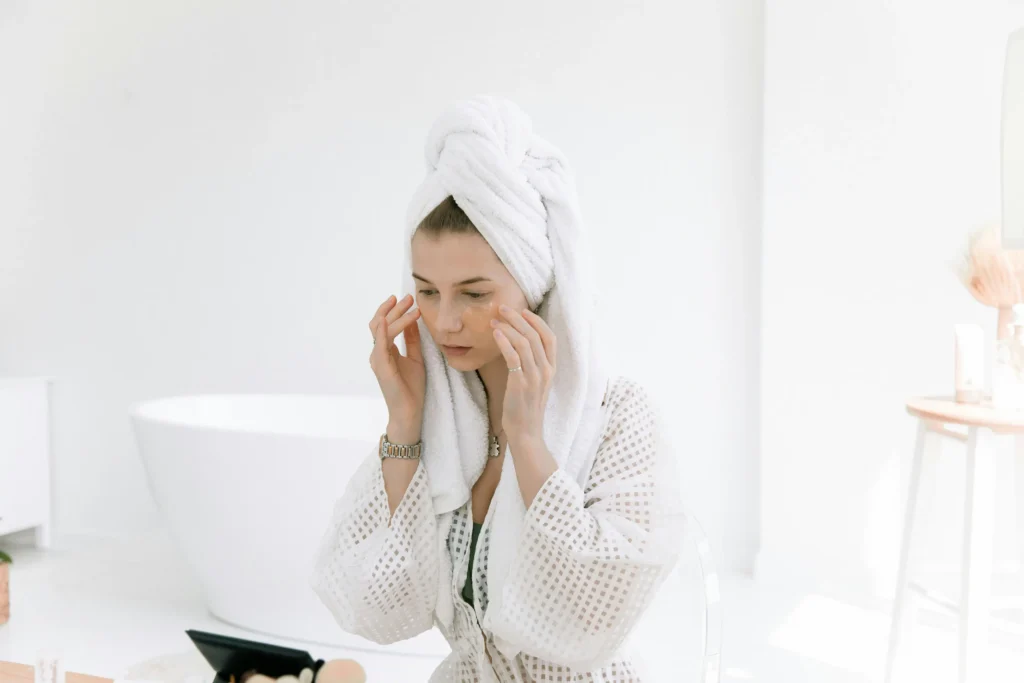 Woman using niacinamide serum for oily skin