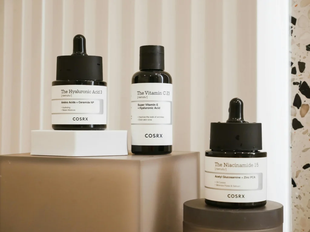 Woman using niacinamide serum for acne prone skin