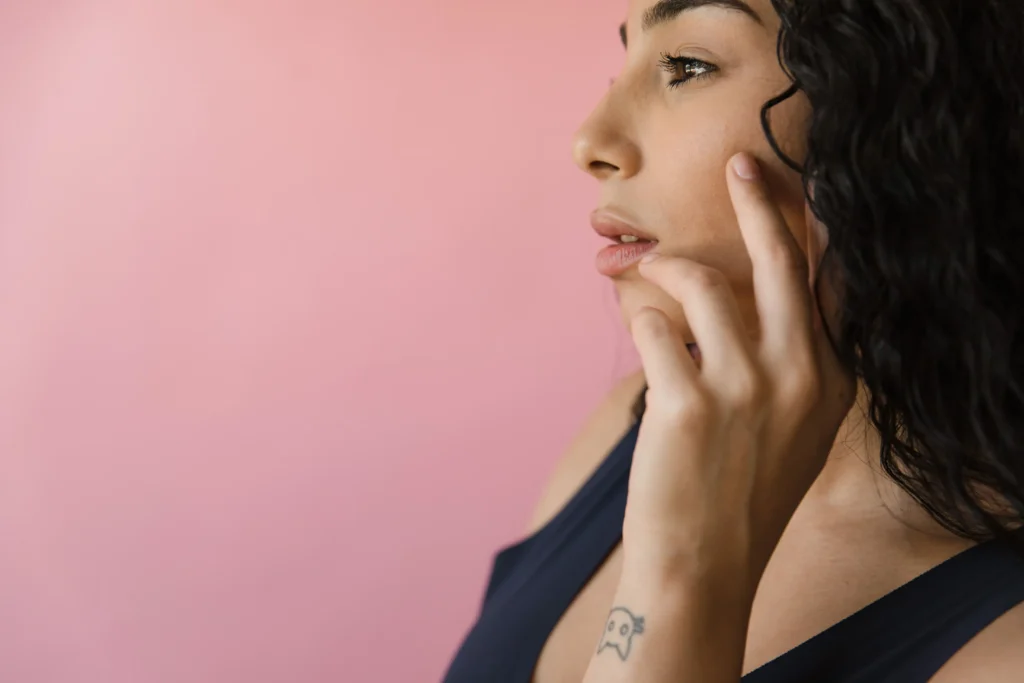 Woman following an anti-aging skincare routine for healthier-looking skin