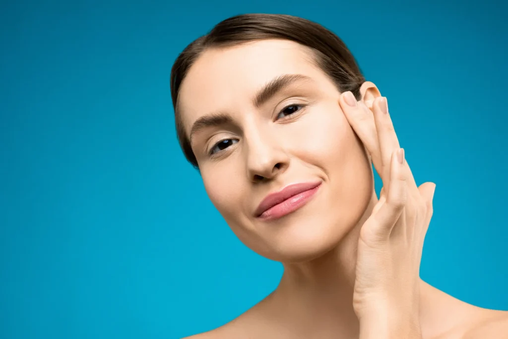 Woman with sensitive skin using a gentle skincare routine