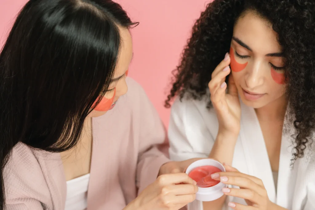 Performing a patch test behind the ear before using a new skincare product